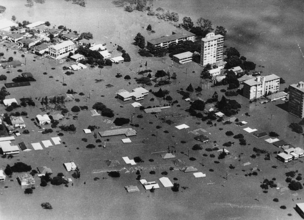 Flood damage at St Lucia caused by 1974 cyclone Wanda, 'John Oxley Library, State Library of Queensland Image: 177197'.