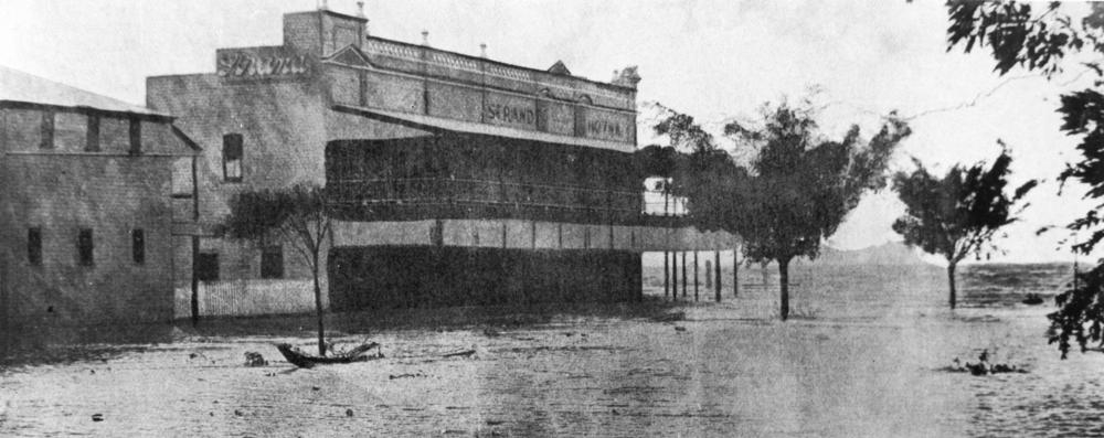 Strand Hotel inundated after the cyclone, Cairns, February 1920. 'John Oxley Library, State Library of Queensland Image: 158091'.