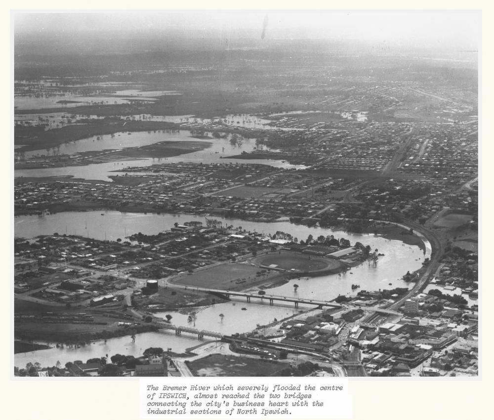 Aerial photograph showing the flooded Bremer River flowing through Ipswich, 1974 'John Oxley Library, State Library of Queensland Image: API-084-0001-0009'.