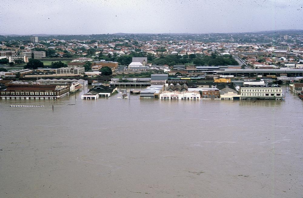 Looking over South Brisbane during the floods, 1974, 'John Oxley Library, State Library of Queensland Image: lbp00080'.