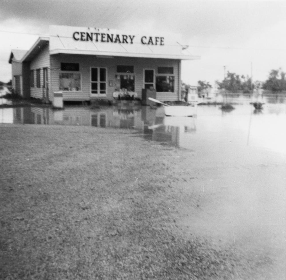 Flood water surrounds the Centenary Cafe in Boulia, 1974.  John Oxley Library, State Library of Queensland Negative number: 141248'