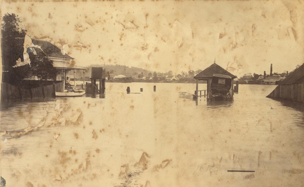 Floodwaters at the Bulimba ferry terminal, Brisbane, January 1887.  'John Oxley Library, State Library of Queensland Image: APO-017-01-0017'.