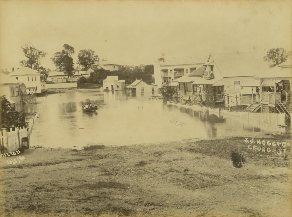 Floodwaters in the street at Milton, Brisbane, 1890.  'John Oxley Library, State Library of Queensland   Image:7866-0001-0015'.