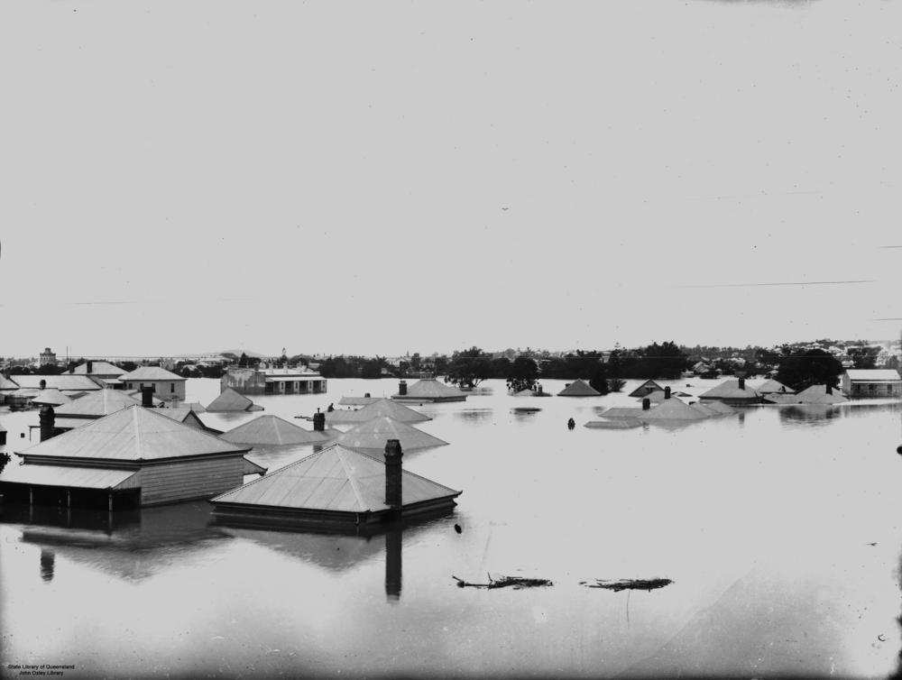 Brisbane River in flood at Milton. Water level is at the roof tops of the houses. 'John Oxley Library, State Library of Queensland   Image: 146845'.
